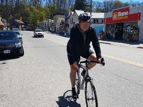 Dr. Pat Milroy cycles in Port Stanley on Tuesday morning. His usual route is from St. Thomas to Port Stanley and back using the bike lanes on Sunset Drive. The county is pushing to become a Bicycle Friendly Community through the Share the Road Cycling Coalition program. (Laura Broadley/Times-Journal)