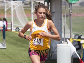 Brogan MacDougall of Kingston, on her way to victory in the junior girls 3,000 metres at the Kingston Area Secondary Schools Athletic Association track and field championships last May, has been named to the Canadian team that will compete in the 2017 Commonwealth Youth Games in July. (TIM GORDANIER/The Whig-Standard)