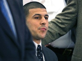 In this April 15, 2015, file photo, former New England Patriots football player Aaron Hernandez listens as the verdict is read finding him guilty in the shooting death of Odin Lloyd, at the Bristol County Superior Court in Fall River, Mass. (Dominick Reuter/Pool Photo via AP, File)