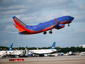 In this Friday, Feb. 10, 2017, file photo, a Southwest Airlines plane takes off from Palm Beach International Airport in West Palm Beach, Fla. (AP Photo/Wilfredo Lee, File)