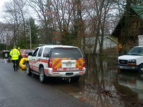 Fire fighters conduct wellness checks in Constance Bay. -