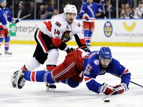 New York Rangers' Mika Zibanejad and Ottawa Senators' Alex Burrows fights for control of the puck during Game 6 at Madison Square Garden on May 9, 2017. (AP Photo/Frank Franklin II)