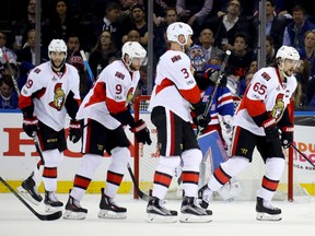 Erik Karlsson of the Ottawa Senators celebrates with teammates Bobby Ryan, Derick Brassard and Marc Methot after scoring a goal against the New York Rangers during Game 6 at Madison Square Garden on May 9, 2017. (Bruce Bennett/Getty Images)