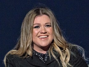 Singer Kelly Clarkson performs at the National Christmas Tree Lighting attended by the first family on the Ellipse December 1, 2016 in Washington, DC. This year is the 94th annual National Christmas Tree Lighting Ceremony. (Photo by Ron Sachs-Pool/Getty Images)
