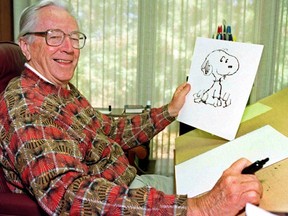 Cartoonist Charles Schulz displays a sketch of his beloved character "Snoopy" in his office in Santa Rosa, Calif. in this 1997 photo.The Peanuts gang of cartoon characters created by Charles Schulz is getting a new home at a Halifax-based entertainment company under a US$345-million deal announced Wednesday. THE CANADIAN PRESS/AP Ben Margot)