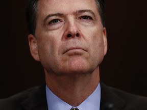 In this Wednesday, May 3, 2017, photo, then-FBI director James Comey pauses as he testifies on Capitol Hill in Washington, before a Senate Judiciary Committee hearing. President Donald Trump abruptly fired Comey on May 9, ousting the nation's top law enforcement official in the midst of an investigation into whether Trump's campaign had ties to Russia's election meddling.(AP Photo/Carolyn Kaster)