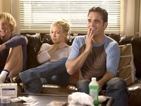 Owen Wilson, left, plays a permanent house guest named Dupree, to a couple played by Kate Hudson, centre, and Matt Dillon in the 2006 film "You, Me and Dupree." (Universal Studios photo)