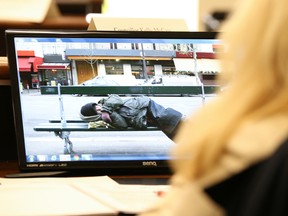 Tim Miller/The Intelligencer
Coun. Kelly McCaw watches a video package on homelessness at a Hastings/Quinte Community and Human Services Committee on Wednesday in Belleville. The video was part of an application to the province for funding under the Home for Good program.