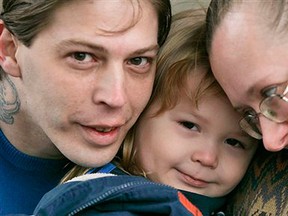 This Tuesday, Dec. 16, 2008 file photo, shows Isidore Heath Campbell, left, his wife, Deborah, and son Adolf Hitler Campbell, 3, in Easton, Pa. On Monday, May 8, 2017, Isidore Heath Campbell officially became Isidore Heath Hitler.  (AP Photo/Rich Schultz, File)