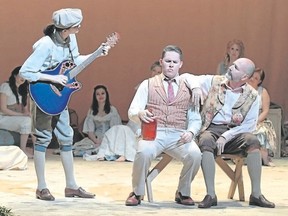 From left, Lliam Buckley plays Feste, Michael Donaldson is Sir Andrew Aguecheek and Steve Favro is Sir Toby Belch in Twelfth Night (or What You Will). (Ross Savidson/Special to Postmedia News)