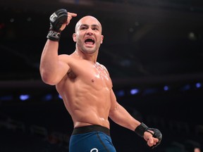 Eddie Alvarez acknowledges fans while working out ahead of UFC 205 on Nov. 9, 2016 at Madison Square Garden. (AP Photo/Julio Cortez)