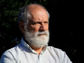 Dr. Louis Francescutti, Professor University of Alberta School of Public Health, poses for a photo at his home, in Sherwood Park, Alta., Thursday Sept. 5, 2013. Dr. Francescutti agrees with a provincial government report that says youth binge drinking is a problem and that the government should consider increasing liquor taxes. Photo by David Bloom