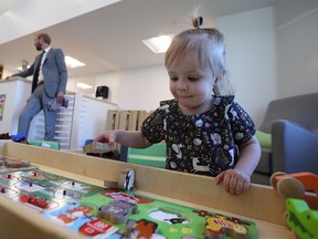 Emma Reimer, 2, explores the space at the open house and ribbon-cutting at Building Blocks on Balmoral, a new child care centre in Winnipeg, on Wed., May 10, 2017. Kevin King/Winnipeg Sun/Postmedia Network