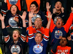 Edmonton Oilers fans watch their team play the Anaheim Ducks on the big screen at Rogers Place in Edmonton on Wednesday May 10, 2017. They were playing game seven of their Stanley Cup playoff series in Anaheim, California. (PHOTO BY LARRY WONG/POSTMEDIA)
