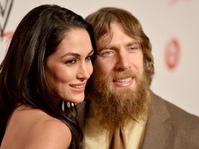 WWE Diva Brie Bella (L) and wrestler Daniel Bryan attend WWE & E! Entertainment's 'SuperStars For Hope' at the Beverly Hills Hotel on August 15, 2013 in Beverly Hills, California. (Photo by Frazer Harrison/Getty Images for WWE)
