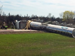 A crash involving a flipped double-tanker transport truck closes Highway 401 for eight hours. Steve Serviss, Kingston Whig-Standard, Postmedia Network