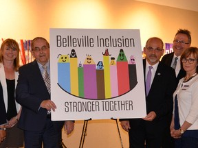Submitted photo
Members of the Belleville inclusion committee gathered at city hall earlier this week to unveil its new logo. The logo was designed by Harry J. Clarke Public School student Holly Morton.