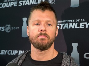 Ottawa Senators defenceman Marc Methot speaks with the media at Canadian Tire Centre on May 11, 2017. (Wayne Cuddington/Postmedia)