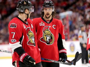 Kyle Turris and Erik Karlsson chat during Game 2 against the New York Rangers at Canadian Tire Centre on April 29, 2017. (Wayne Cuddington/Postmedia)