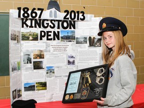 Erin Smith, in Grade 7 at Loughborough Public School, looked at what life was like in the Kingston Penitentiary in 1867 and 2013 as part of her project at the 22nd annual Kingston Regional Heritage Fair on Thursday. (Julia McKay/The Whig-Standard)