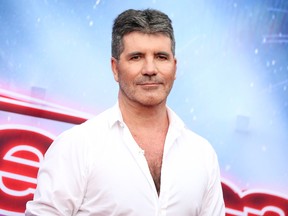 In this March 3, 2016 file photo, Simon Cowell arrives at the "America's Got Talent" Season 11 Red Carpet Kickoff in Pasadena, Calif.  (Photo by Rich Fury/Invision/AP, File)