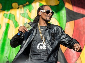 In this May 6, 2017, file photo, Snoop Dogg performs at the New Orleans Jazz and Heritage Festival in New Orleans. (Photo by Amy Harris/Invision/AP, File)