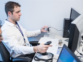 Éric Carrière photo/Courtesy Canadian Space Agency
2nd Lt. Francis Frenzel works through a Canadian Space Agency aptitude test Tuesday, April 11, 2017. He's one of 17 astronaut candidates.