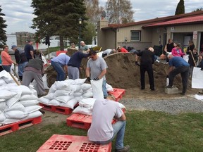 Submitted photo
Roughly 40 people help fill sandbags at the North Shore RV Park in Carrying Place. The rising water levels across Quinte have prompted municipalities to monitor levels closely and have resulted in declarations of a state of emergency in both Prince Edward County and by the Mohawks of the Bay of Quinte.