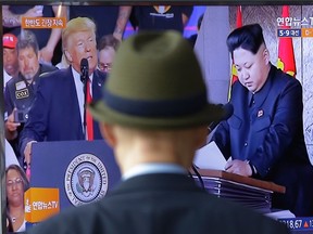 In this Tuesday, May 2, 2017, photo, a TV screen shows images of the U.S. President Donald Trump, left, and North Korean leader Kim Jong Un during a news program at the Seoul Railway Station in Seoul, South Korea. South Koreans are bewildered by President Donald Trump’s recent use of the term “smart cookie” to refer to current leader Kim Jong Un, and by Trump’s assertion that he’d be “honored” by a possible meeting. AP Photo/Ahn Young-joon