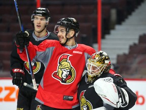 Jean-Gabriel Pageau and Mike Condon of the Ottawa Senators have fun during morning practice at Canadian Tire Centre in Ottawa on May 12, 2017. (Jean Levac/Postmedia)