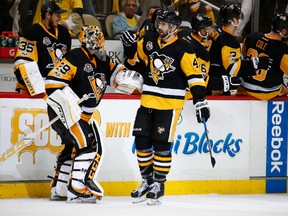 Justin Schultz of the Pittsburgh Penguins celebrates his third-period goal with Marc-Andre Fleury during Game 3 against the Washington Capitals at PPG Paints Arena on May 1, 2017. (Gregory Shamus/Getty Images)