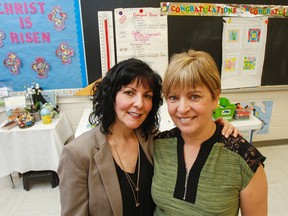 Rosemary Couto, left, has been named teacher of the year by the Algonquin and Lakeshore Catholic District School Board, seen here with fellow teacher at Our Lady of Lourdes Catholic School, Nathalie Beliveau-Scott, who nominated her with help from the parents, students and staff. (Julia McKay/The Whig-Standard)