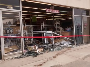 A Volkswagen Beetle crashed through the front window of a Fabricland Friday, May 12, 2017 in Edmonton.
