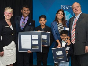 Tracey Scarlett, Dean of the JR Shaw School of Business, Ashif Mawji, Kinza Mawji, 11, Zainul Mawji, Aariz Mawji, 7, and NAIT President and CEO Dr. Glenn Feltham pose for a photo after the Mawji family announced a $1 million donation to help establish the Mawji Centre for New Venture and Student Entrepreneurship at NAIT, in Edmonton Friday May 12, 2017. David Bloom/Postmedia