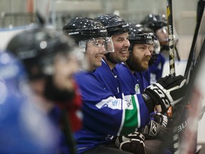 The AIM Building Maintenance team is seen during their game versus the Running Room & Formations team at the 4th annual Hockey Helps The Homeless Edmonton Tournament at Terwillegar Community Recreation Centre in Edmonton, Alta. on Friday, May 12, 2017.