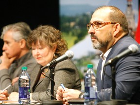 Municipal Affairs Minister Bill Mauro, Natural Resources Minister Kathryn McGarry and Energy Minister Glenn Thibeault take questions Friday from delegates during the “bear pit session” at the annual Federation of Northern Ontario Municipalities (FONOM) conference in North Bay. 
Gord Young/The Nugget