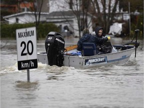 Power boaters have been asked to stay off the Ottawa River while flood recovery continues. JUSTIN TANG / THE CANADIAN PRESS
