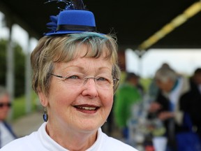 Leslie MacDonald sports blue-dyed hair and matching hat at the Quinte West Walk for Alzheimer’s at Centennial Park on Saturday May 13, 2017 in Trenton, Ont. For MacDonald, the annual walk is a way to give back to the local Alzheimer Society after all the help they gave her before the death of her husband, Brian. Tim Miller/Belleville Intelligencer/Postmedia Network