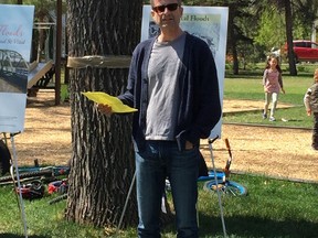 Resident Ted Bock speaks at a ceremony to mark the 20th anniversary of the day residents of Kingston Crescent were allowed to return home after days of evacuation due to threat of the 1997 Flood of the Century at Kingston Park in Winnipeg on Saturday, May 13, 2017. Bock and his wife Liane were evacuated from their home for over two weeks.