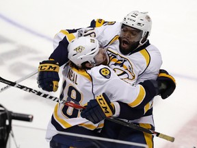 Nashville Predators forward James Neal, left, celebrates with P.K. Subban after scoring against the Anaheim Ducks in overtime of Game 1 of the Western Conference final Friday, May 12, 2017, in Anaheim, Calif. (AP Photo/Chris Carlson)