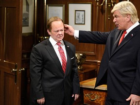 In this photo provided by NBC, Melissa McCarthy as White House Press Secretary Sean Spicer, left, and Alec Baldwin as U.S. President Donald Trump perform during "Spicer Returns" on the television show "Saturday Night Live," Saturday, May 13, 2017, in New York. (Will Heath/NBC via AP)