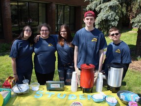 Members of the student wellness committee serve up refreshments at Alexander Mackenzie Secondary School Saturday. The Sarnia high school threw open its doors this weekend for its second annual spring showcase for current and prospective students and their families. Pictured here are students Brie Grant, Michelle Wilkinson, Jacquelyn Chipman, Nick Porsius and Mathew Mitchell. Barbara Simpson/Sarnia Observer/Postmedia Network