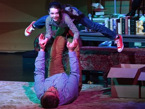 Zoe Brown plays young Allison Bechdel while Duane Woods plays her father Bruce Bechdel in Fun Home. (MORRIS LAMONT, The London Free Press)