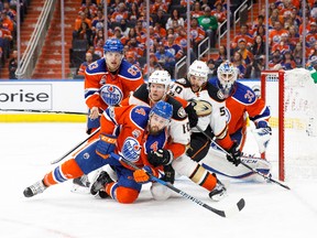 Edmonton Oilers defenceman Kris Russell (4) battle against Corey Perry (10) and Antoine Vermette (50) of the Anaheim Ducks in Game 6 of their Western Conference second round playoff series at Rogers Place on May 7, 2017, in Edmonton. (Getty Images)