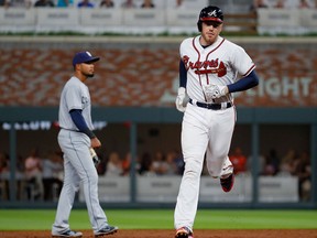 Freddie Freeman of the Atlanta Braves rounds second base after hitting a two-run homer in the third inning against the San Diego Padres at SunTrust Park on April 17, 2017 in Atlanta, Georgia.  (KEVIN C.COX/Getty Images)