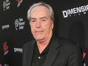 In this Aug. 19, 2014 file photo, actor Powers Boothe attends the Los Angeles premiere of "Sin City: A Dame To Kill For" in Los Angeles. (Photo by Todd Williamson/Invision/AP, File)