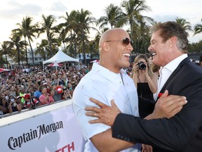 Dwayne Johnson and David Hasselhoff attend the world premiere of Paramount Pictures film 'Baywatch' at South Beach on May 13, 2017 in Miami, Florida. (Photo by Alexander Tamargo/Getty Images for Paramount Pictures)