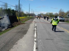 Mitch Owens Drive in North Gower has been closed after a collision between a dump truck and a car on Monday morning.