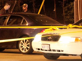 Toronto Police at the scene on York Mills Rd. near the DVP late Sunday, May 14, 2017 after a car was shot up. (John Hanley/Toronto Sun)
