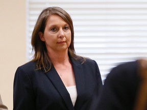 Betty Shelby leaves the courtroom following testimony in her trial in Tulsa, Okla., on Friday, May 12, 2017. Shelby is charged with manslaughter in the shooting of Terence Crutcher, an unarmed black man. (AP Photo/Sue Ogrocki)